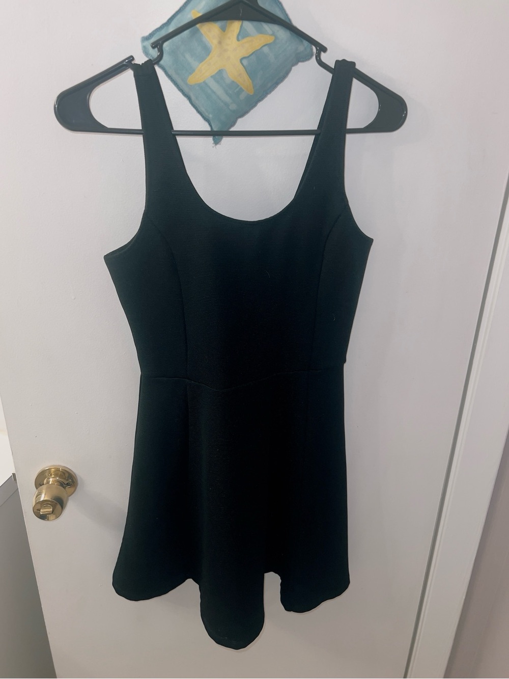 Divided size 4 black skater dress